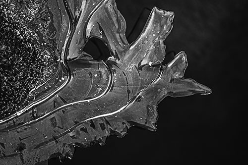 Smooth Ice Face Creature Hanging Above River Shoreline (Gray)