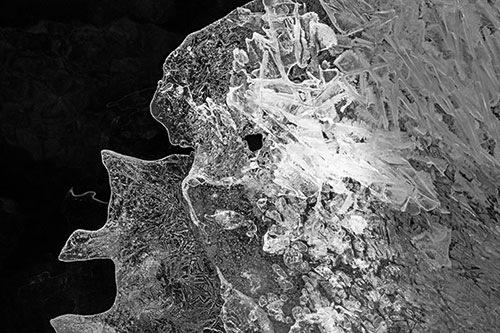 Two Faced Optical Illusion Ice Face Hanging Above River (Gray)