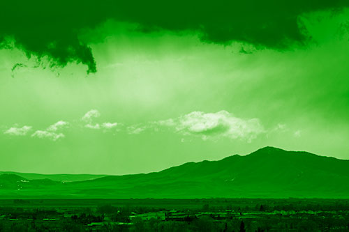 Dark Cloud Mass Above Mountain Range Horizon (Green Shade Photo)