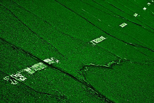 Decomposing Pavement Markings Along Sidewalk (Green Shade Photo)