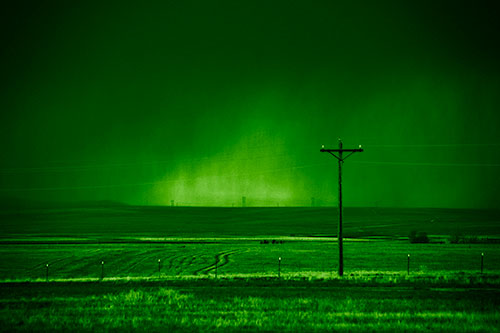 Distant Thunderstorm Rains Down Upon Powerlines (Green Shade Photo)
