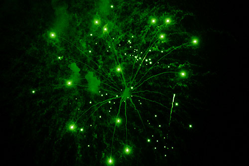 Firework Light Orbs Free Falling After Explosion (Green Shade Photo)