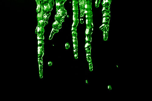 Jagged Melting Icicles Dripping Water (Green Shade Photo)