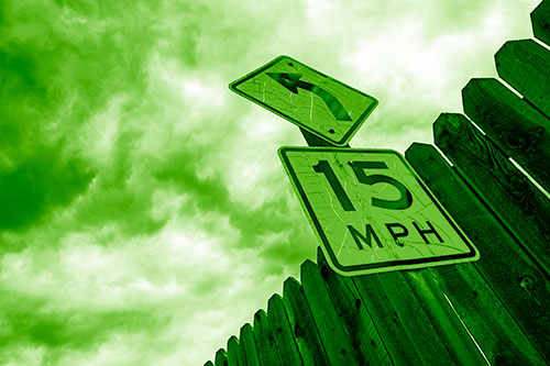 Left Turn Speed Limit Sign Beside Wooden Fence (Green Shade Photo)