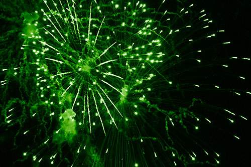 Multiple Firework Explosions Send Light Orbs Flying (Green Shade Photo)