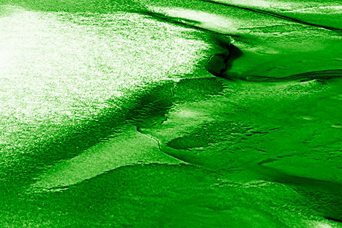 Sloping Ice Melting Atop River Water (Green Shade Photo)