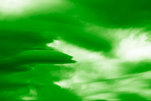 Smooth Cloud Sails Along Swirling Formations (Green Shade Photo)