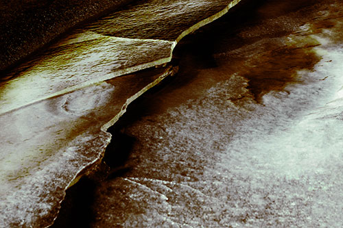 Cracking Blood Frozen Ice River (Green Tint Photo)