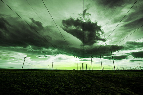 Creature Cloud Formation Above Powerlines (Green Tint Photo)