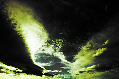 Curving Black Charred Sunset Clouds (Green Tint Photo)