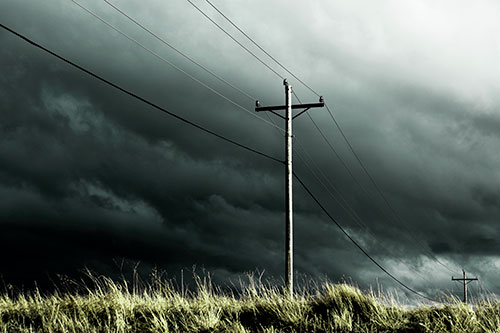 Dark Thunderstorm Clouds Over Powerline (Green Tint Photo)
