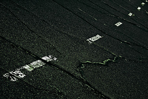Decomposing Pavement Markings Along Sidewalk (Green Tint Photo)