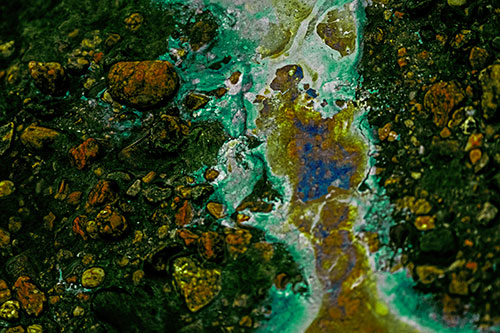 Distorted Oil Face Smearing Among Rocky Shore (Green Tint)