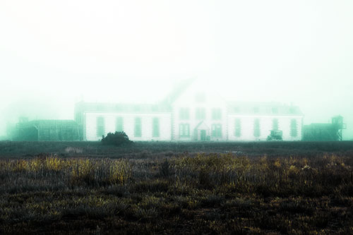 Fog Engulfs Historic State Penitentiary (Green Tint Photo)