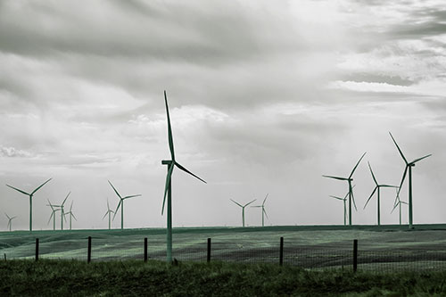 Gloomy Clouds Overcast Wind Turbine Pasture (Green Tint Photo)