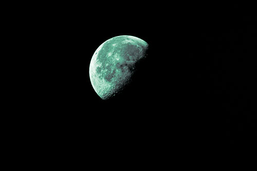 Half Blue Moon During Morning Orbit (Green Tint Photo)