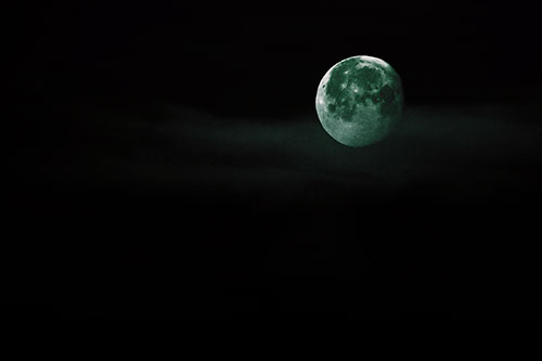 Moon Sets Behind Faint Clouds (Green Tint Photo)