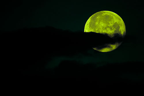Pac Man Moon Swallows Clouds (Green Tint Photo)