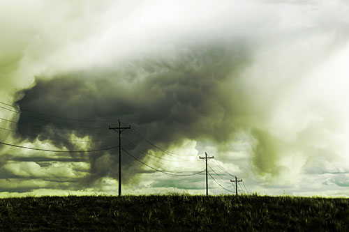 Rainstorm Clouds Twirl Beyond Powerlines (Green Tint Photo)