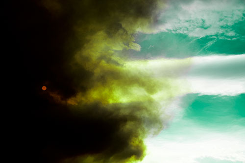 Sun Spiraling Out Of Mullen Fire Clouds (Green Tint Photo)