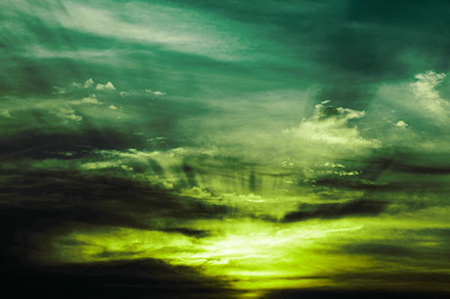 Sunrise Bursting Colorful Light Past Clouds (Green Tint Photo)