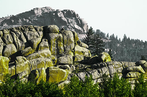 Two Towering Rock Formation Mountains (Green Tint Photo)