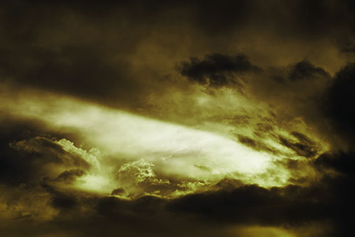 White Light Tearing Through Clouds (Green Tint Photo)
