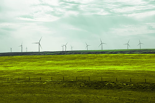 Wind Turbines Scattered Along Prairie Horizon (Green Tint)