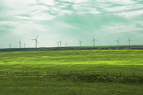 Wind Turbines Scattered Along The Prairie Horizon (Green Tint Photo)