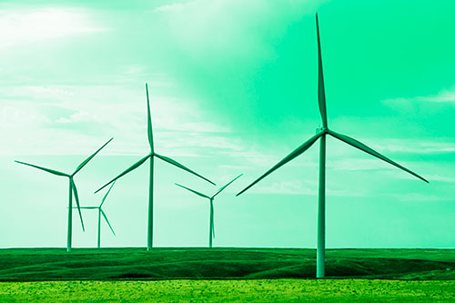 Wind Turbines Standing Tall On Green Pasture (Green Tint Photo)