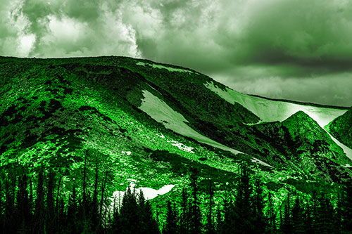 Clouds Cover Melted Snowy Mountain Range (Green Tone Photo)