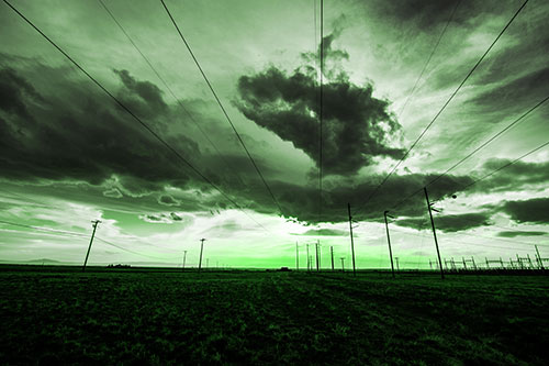 Creature Cloud Formation Above Powerlines (Green Tone Photo)