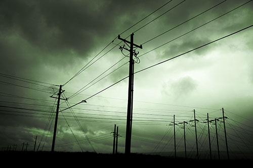 Crossing Powerlines Beneath Rainstorm (Green Tone Photo)