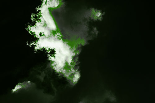 Evil Cloud Face Snarls Among Sky (Green Tone Photo)