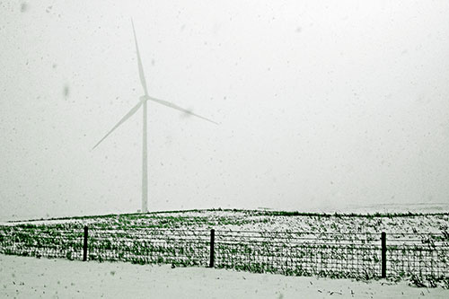 Fenced Wind Turbine Among Blowing Snow (Green Tone)