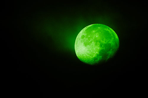 Fireball Moon Setting After Sunrise (Green Tone Photo)