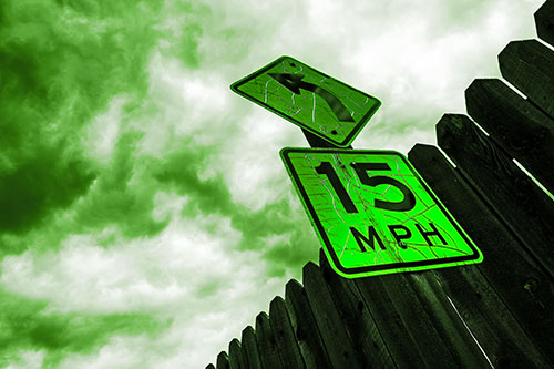 Left Turn Speed Limit Sign Beside Wooden Fence (Green Tone Photo)