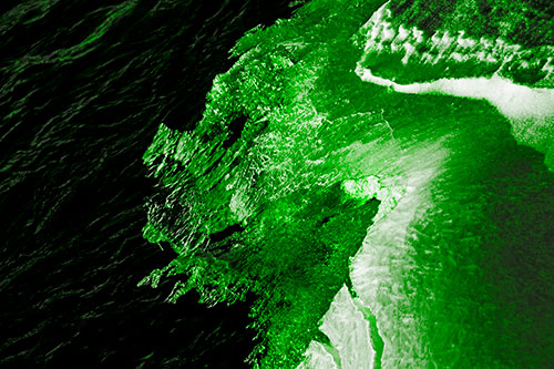 Melting Ice Face Creature Atop River Water (Green Tone Photo)