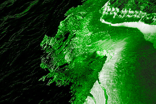 Melting Ice Face Creature Atop River Water (Green Tone)