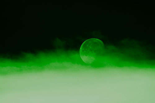 Moon Rolling Along Clouds (Green Tone Photo)