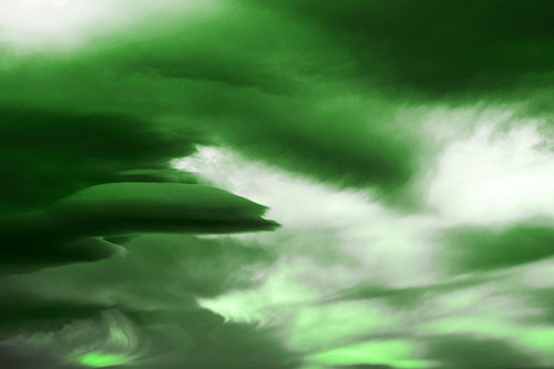 Smooth Cloud Sails Along Swirling Formations (Green Tone Photo)