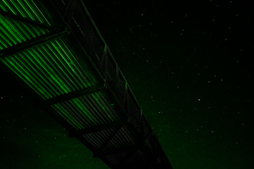 Stars Shining Above Walkway Bridge (Green Tone Photo)