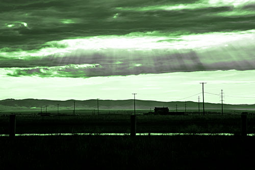 Sunlight Bursts Powerline Horizon After Rainstorm (Green Tone Photo)