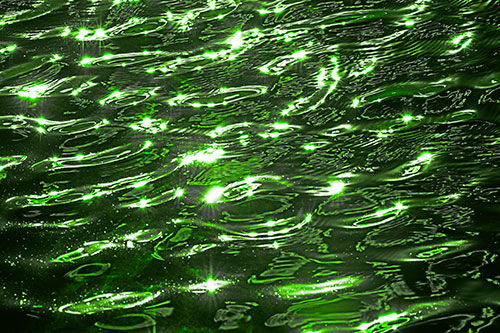 Water Ripples Sparkling Among Sunlight (Green Tone Photo)