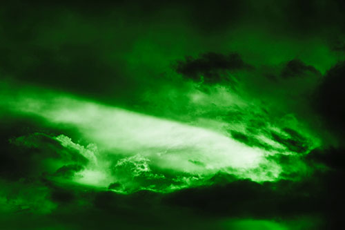 White Light Tearing Through Clouds (Green Tone Photo)
