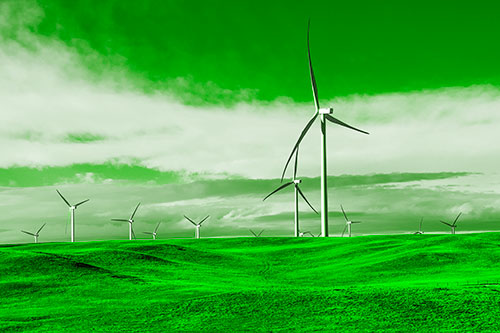 Wind Turbine Cluster Overtaking Hilly Horizon (Green Tone Photo)
