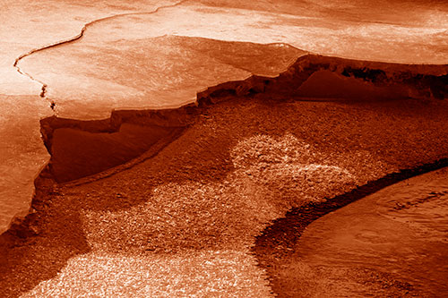 Cracked Ice Frozen Shoreline Melting (Orange Shade Photo)
