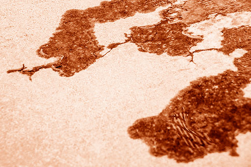 Creeping Water Puddle Across Concrete Pavement (Orange Shade)