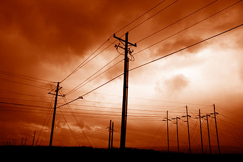 Crossing Powerlines Beneath Rainstorm (Orange Shade Photo)