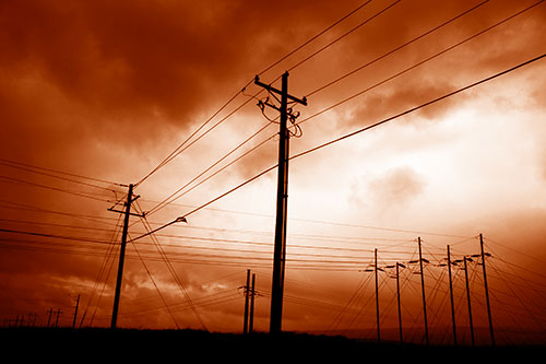 Crossing Powerlines Beneath Rainstorm (Orange Shade Photo)